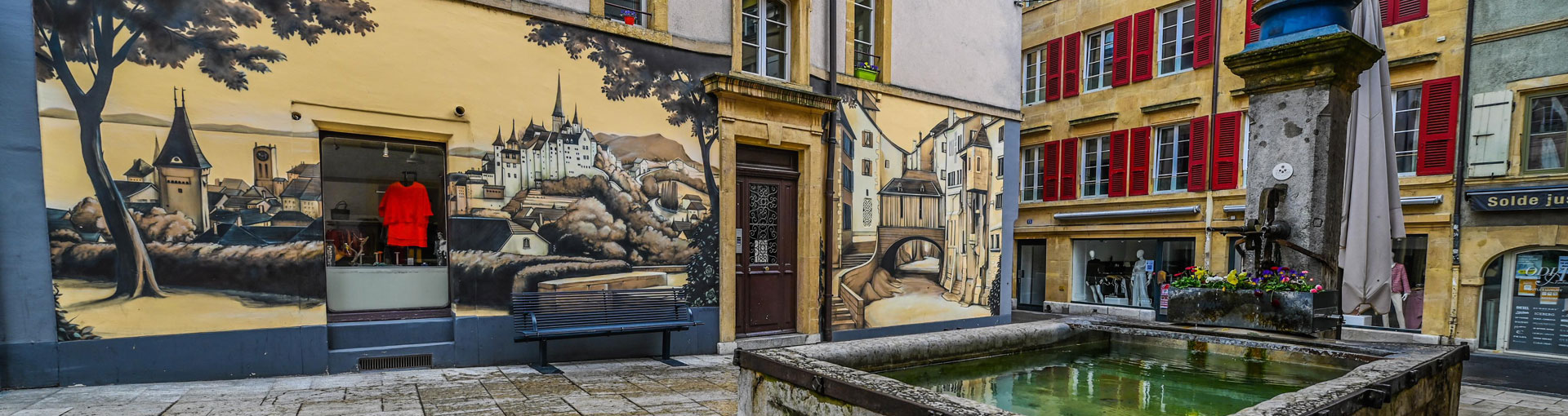 La fresque du passage des Boucheries, une vue de la rue du Seyon avant le détournement